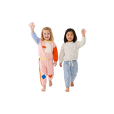 Pastel Playtime kids clothing set by Clay and Hutch. Halcyon Nights - Fleece Sweater | Little Billabong Pink, Grown - Organic Funfetti Knit Pull Over | Surf, Halcyon Nights - Fleece Track Pants | Little Billabong Pink and Grown -  Organic Flow | Denim Pants clothing kids set.
